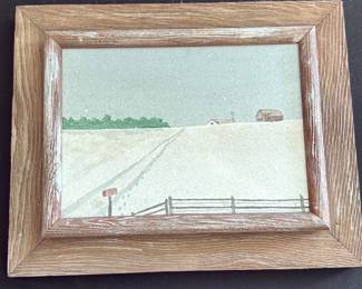Framed Rustic Farm Landscape — Small framed folk-style landscape showing a snowy or pale field with distant barns, a fence and mailbox motif. The wood-look frame has a distressed, rustic finish and the artwork appears to be a watercolor or print on paper. Good decorative condition with light wear to the frame edges consistent with age and use; glass intact and image well centered. A simple, country-style piece that fits a bedroom or casual living space and is ready to hang or display on a shelf.