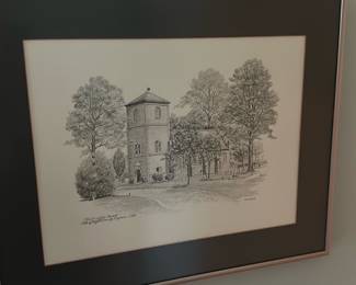 Framed Black & White Church Print — Framed black-and-white architectural print depicting Old St. John's Church (Hand-signed lower right). The piece is double-matted with a black inner mat and simple silver metallic frame; glass appears intact. Overall size is modest and well suited for hallway or bathroom hanging. The print shows light age-related toning to the paper and minor scuffs to the frame but is stable and display-ready.