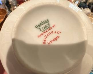 Haviland & Co. Limoges set — Decorated by Haviland & Co., Limoges, this porcelain tea cup and saucer set bears the Haviland France mark on the base and a delicate floral border pattern on the rim. The set is classic Limoges porcelain with fine thin-walled construction and hand-applied decoration typical of Haviland pieces. Photos show multiple matching cups and saucers included in the lot; pieces appear intact with light surface wear and typical age-related crazing or minor marks visible in close-up. A good choice for collectors of French Limoges tableware or for elegant everyday use.