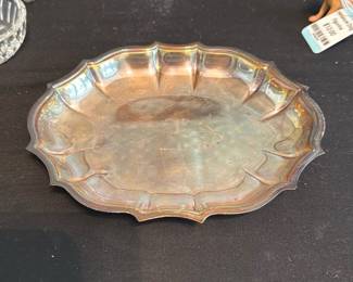 Silverplate Scalloped Dish — Small scalloped silverplate bonbon or serving dish with molded, stepped rim and soft iridescent tarnish. Light surface scratches and spots of wear to the plating are visible on both interior and underside; no visible maker's mark in photos. A classic small serving/trinket dish suitable for jewelry, keys or small candies, measures approximately as shown below.