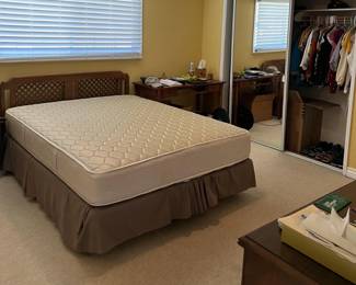 In this sale we have a queen-sized bedframe, and clothes in the closet.  Don't forget the small desk in the corner.
