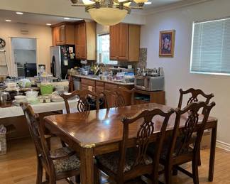 Most of our sales include some sort of dining table and matching chairs.  This sale is no exception.  But look at the other details in the background, too.
