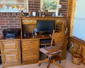 roll top desk, desk chair, office supplies, file cabinet