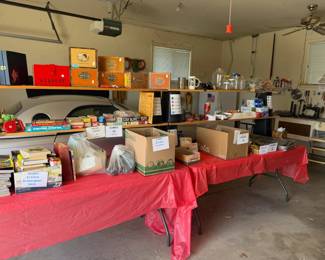books, magazines, cigar boxes, Tupperware, floral, dog grooming tools, dog toys, vases, bakeware, light bulbs, batteries