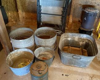 galvanized buckets and tubs, lawn chairs, small kerosene space heater