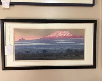 Framed artwork is a Japanese woodblock print titled "Kilimanjaro, Morning" by artist Toshi Yoshida. Published in 1977 reportedly using 16 woodblocks and 50 impressions.