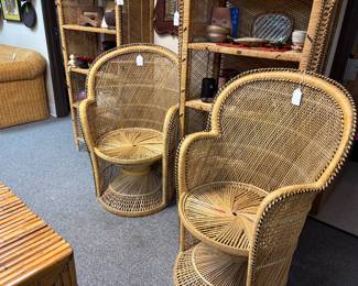 Two vintage peacock chairs