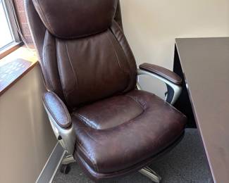 Lazy Boy leather high back swivel adjustable chair.