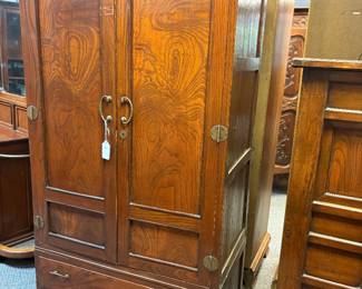 Antique cabinet w calligraphic paper lining. 
