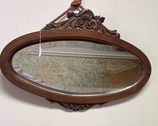 Vintage oval beveled mirror.