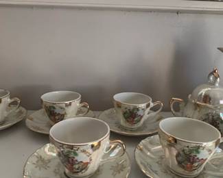 Vintage Japanese Porcelain Tea Set with Courting Couple Scene and Gilded Trim second image