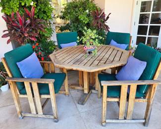 Teak Dining Set and Potted Plants