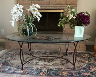 Oval Glass Top Coffee Table with Scrolled Metal Base
