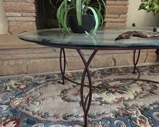 Oval Glass Top Coffee Table with Scrolled Metal Base second image