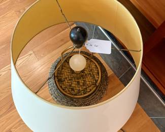 V51 - $40. Large Rattan Base Table Lamp. Shade is in good condition. Measures 36” Tall.