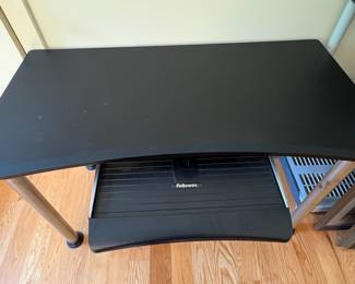 V86 - $30. Computer desk. Measures 47.25” x 23.5” x 29.5” Tall.