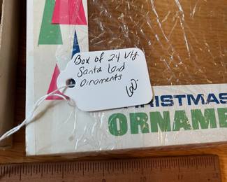 V125 - $60. Box of 24 Vintage Santa Land Ornaments. Very good vintage condition.