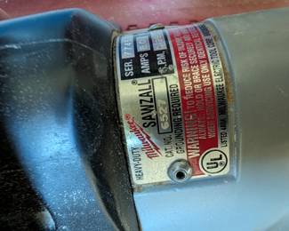 V154 - $60. Milwaukee Sawzall Corded with metal case & extra blades.