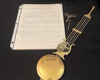 V163 - $125. Vintage Ansonia Gold Medallion Wall Clock. Untested. Measures 15" x 7" x 35" Tall.