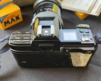 V110 - $60. Minolta 700 Camera, 35-100 Lens, 50 Lens and Accessories. Untested