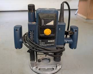 V147 - $80. Bosch Plunge Router 1613EVS.