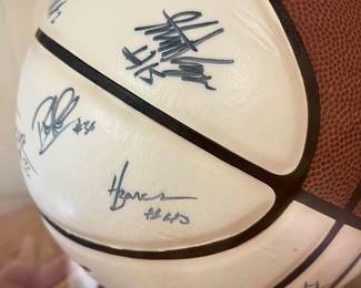 V104 - $250. 2010-2011 Season UNC Signed Basket Ball in Display Case. Signed by Players and Coaches.