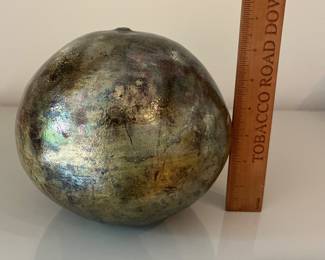 V33 - $35. Raku Seed Vase signed KAR on the base.