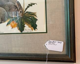 V71 - $50. Ray Harm "Young Cottontails" signed & numbered print. Measures 24" x 27.5" framed.