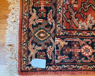 V69 - $95. Area Rug. Measures 74" x 48".