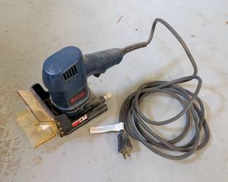 V150 - $35. Ryobi Biscuit Joiner Model DBJ50.