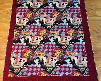 V169 - $45. Small Cat Quilt. Made By Durham - Orange Quilters. Measures 40.5" x 49.5".