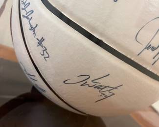 V104 - $250. 2010-2011 Season UNC Signed Basket Ball in Display Case. Signed by Players and Coaches.