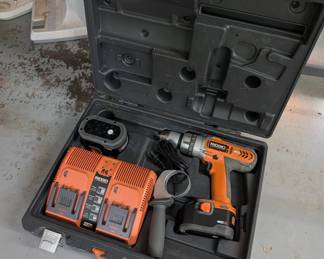 V168 - $70. Ridgid Drill and Battery Charger.