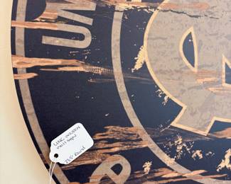 V99 - $20. UNC Wooden Wall Sign. Measures 23” Diameter. Heritage Logo Design.