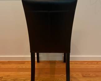 V4 - $1600. Set of 8 Crate and Barrel Lowe Onyx Dining Chairs with Ebony Legs. Measures 18.5” Wide x 19” Deep x Floor to seat 19” x Floor to back 35” Tall. All in Excellent Condition.