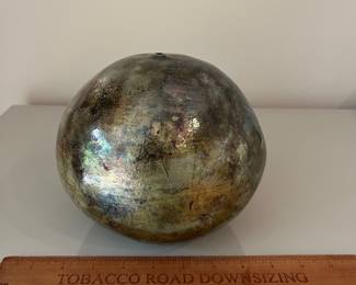 V33 - $35. Raku Seed Vase signed KAR on the base.