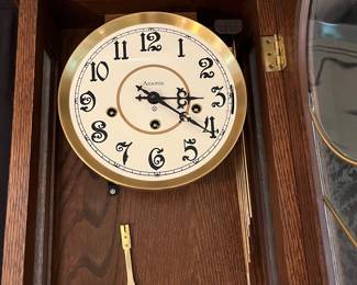 V163 - $125. Vintage Ansonia Gold Medallion Wall Clock. Untested. Measures 15" x 7" x 35" Tall.