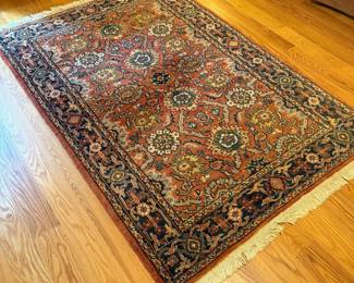 V69 - $95. Area Rug. Measures 74" x 48".