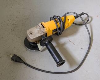 V151 - $30. Dewalt DW402 4.5" Angle Grinder.