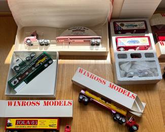 V39 - $160. Lot of 16 Winross Model Trucks and 2 Coin Banks. All new.