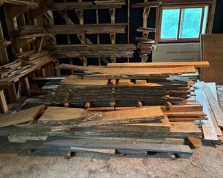 Wood includes; ash, white oak, pine, cherry.  All hand cut, rough sawn lumber of varying lengths & thickness