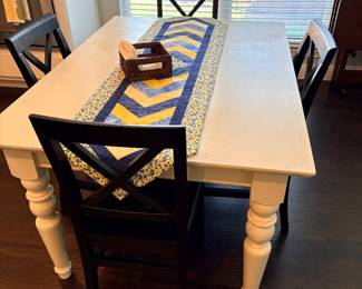 White farmhouse table with black chairs 56”L 40”W 30”H