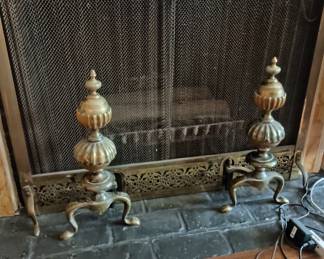 Brass andirons and fireplace screen