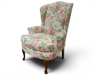 Pastel floral Chintz covered wing back chair