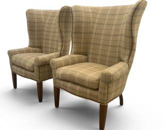 Pair of neutral tartan wool upholstered wing chairs with tacking
