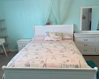 White Sleigh Bed Frame with Paris-themed Bedding