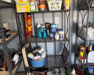 Ornate Metal Shelf Unit with Assorted Household Items