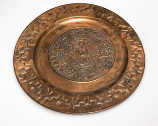 Lot 504: Mexican Repoussé Copper Aztec Calendar Wall Charger