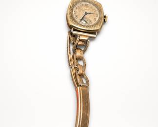 Lot 981: Elgin Engraved Cushion-Case Wristwatch
