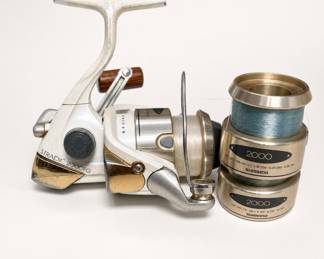 Lot 237: Shimano Stradic 2000FG Spinning Reel with 2 Extra Spools